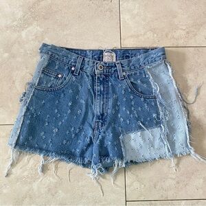 Levi's first of a kind distressed denim shorts